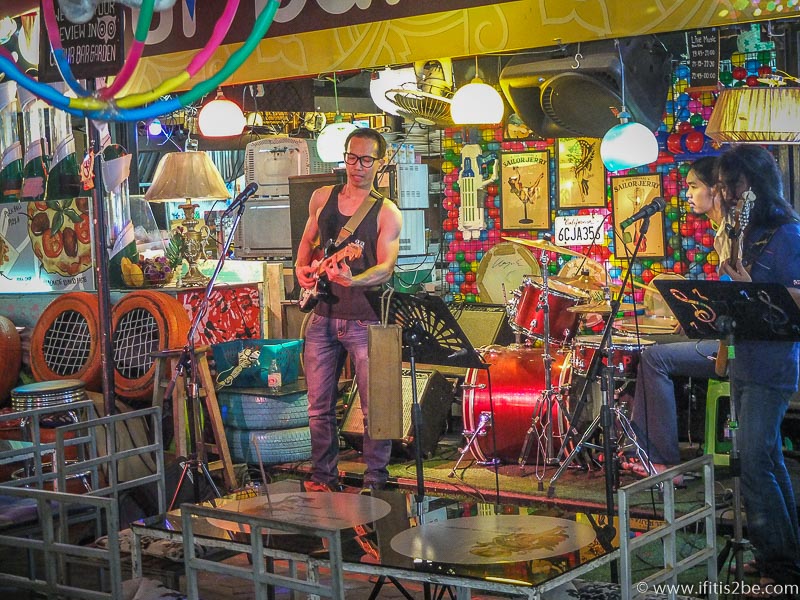 A singer having a mini-concert at the night market in Chiang Mai