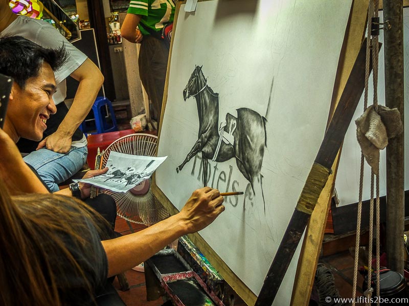 Artist Recreating images at the night market in Chiang Mai